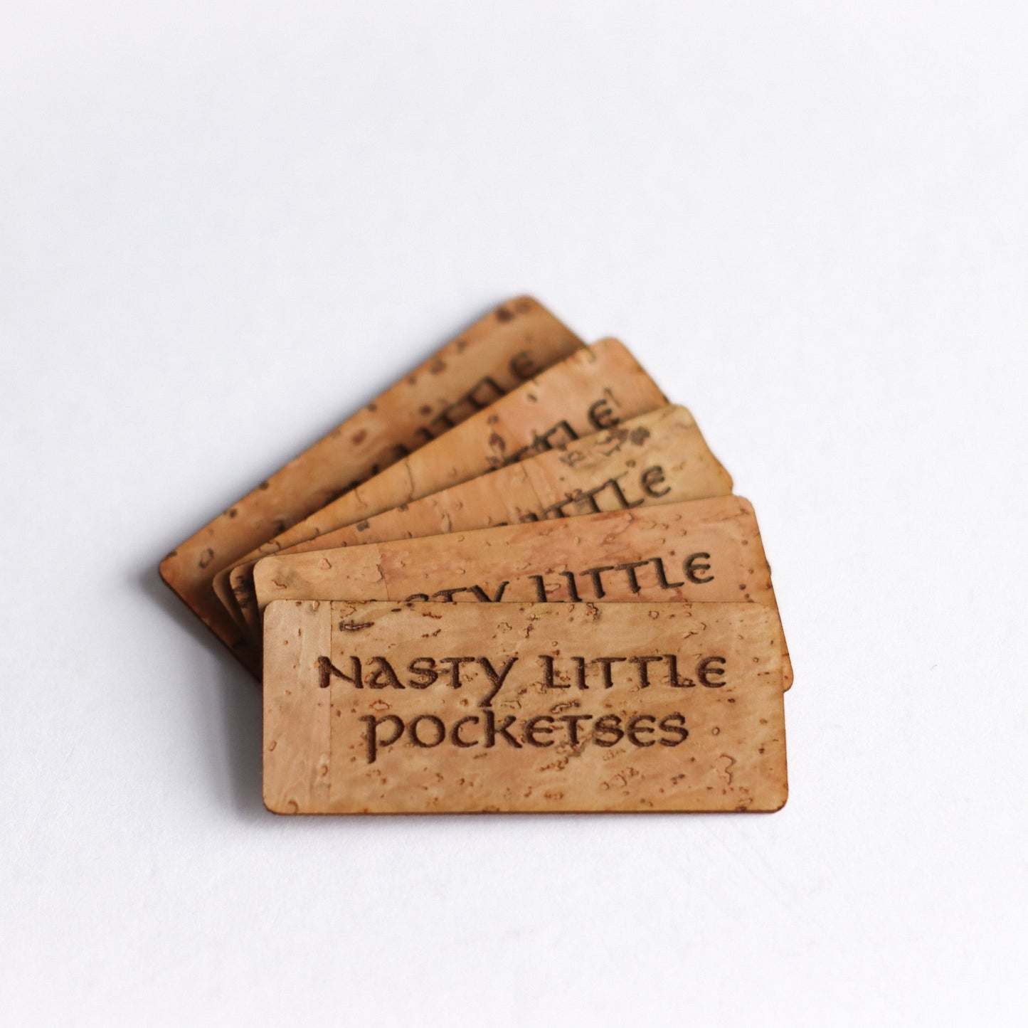 Nasty Little Pocketses Cork Tag