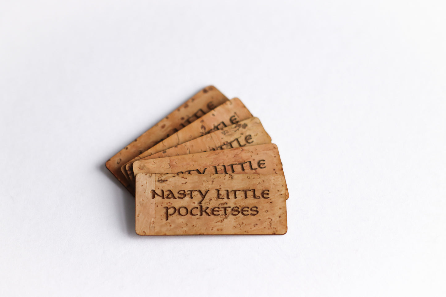 Nasty Little Pocketses Cork Tag