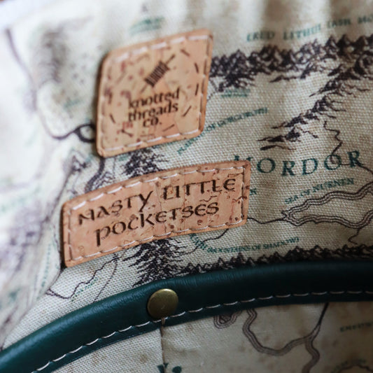 Nasty Little Pocketses Cork Tag